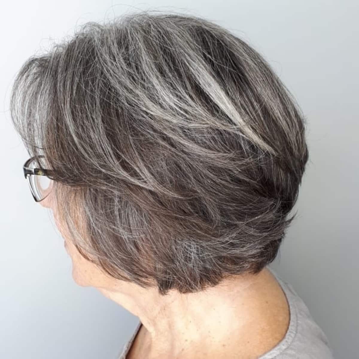 short feathered bob for seniors with glasses