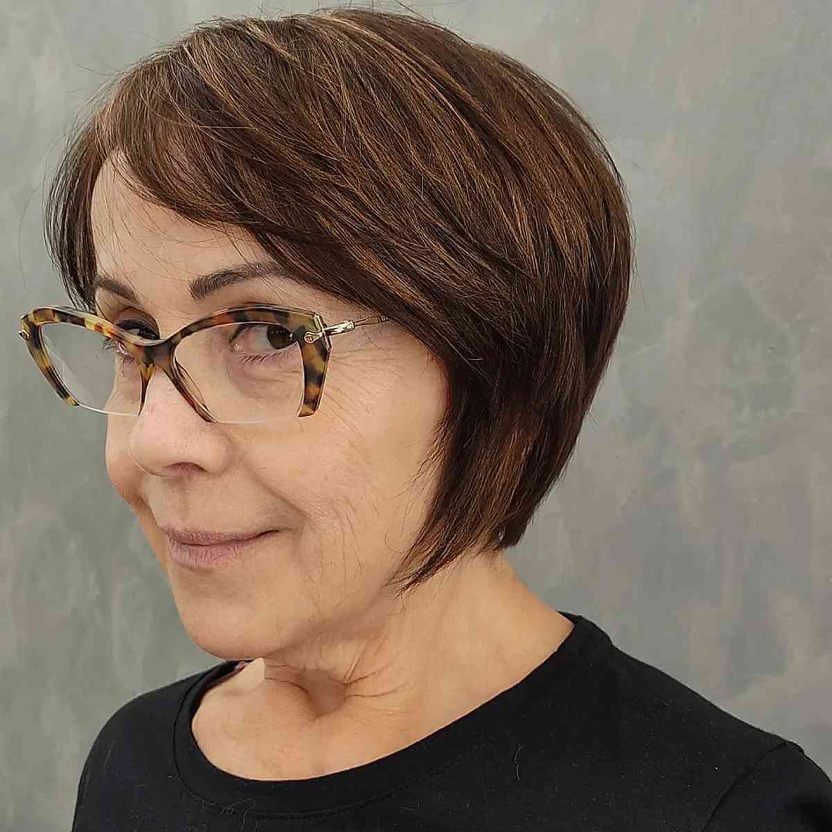 youthful side swept bob cut for a year old with glasses