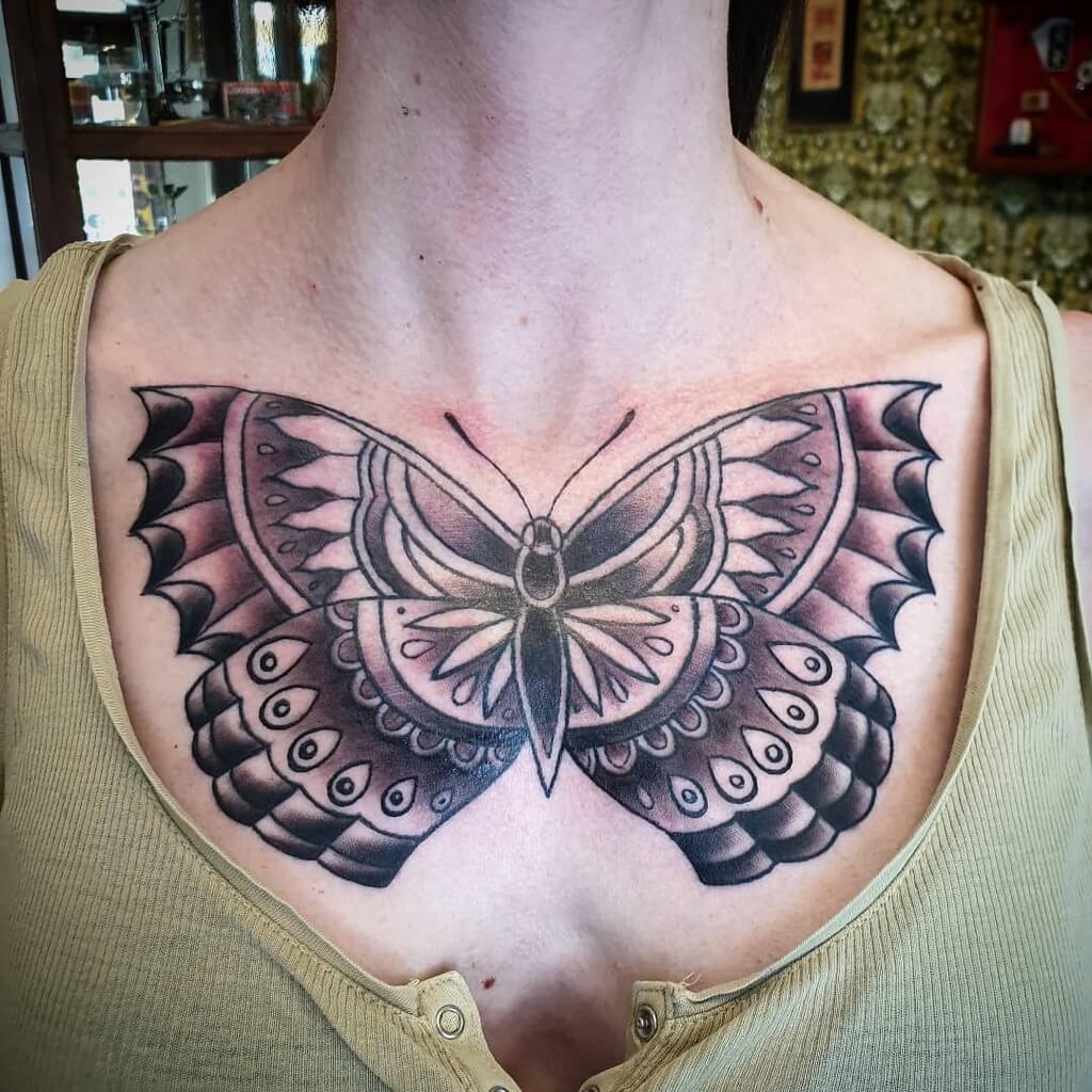 Butterfly Breast Tattoo