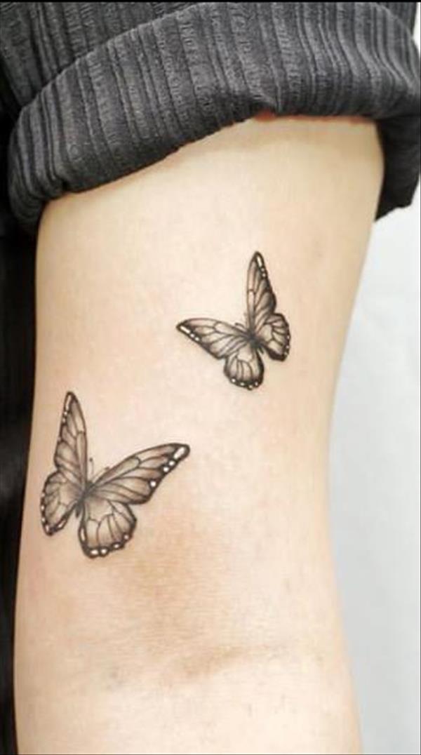 Dark black butterfly tattoo