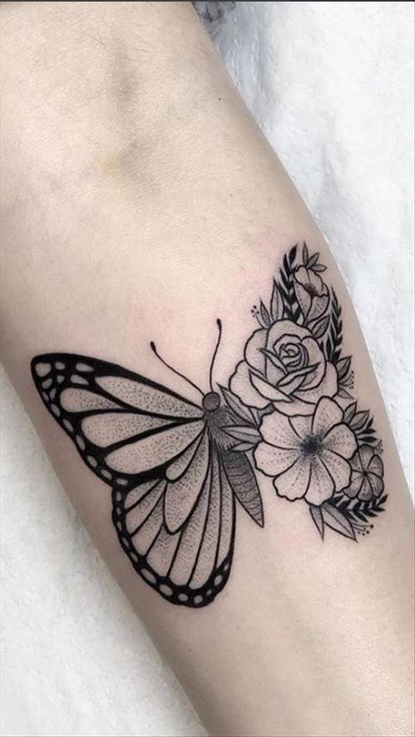 Tattoo of half butterfly and half flower