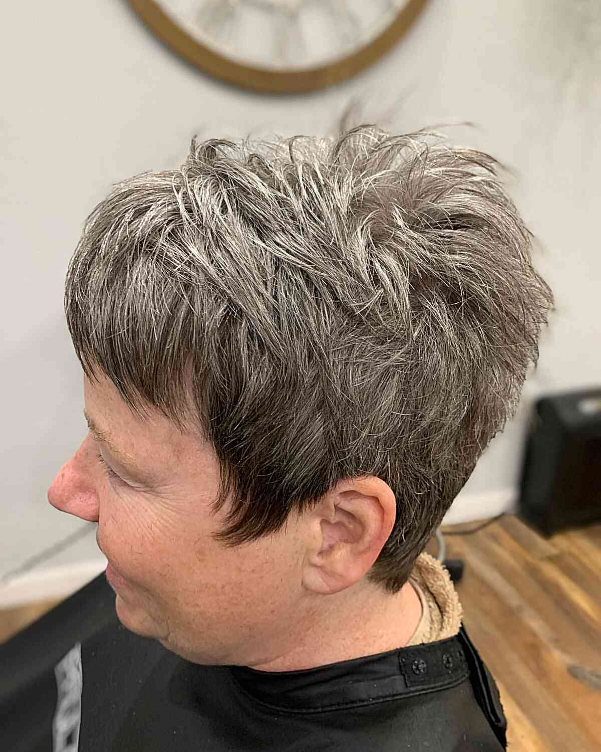 choppy short tapered pixie with short bangs for older women aged