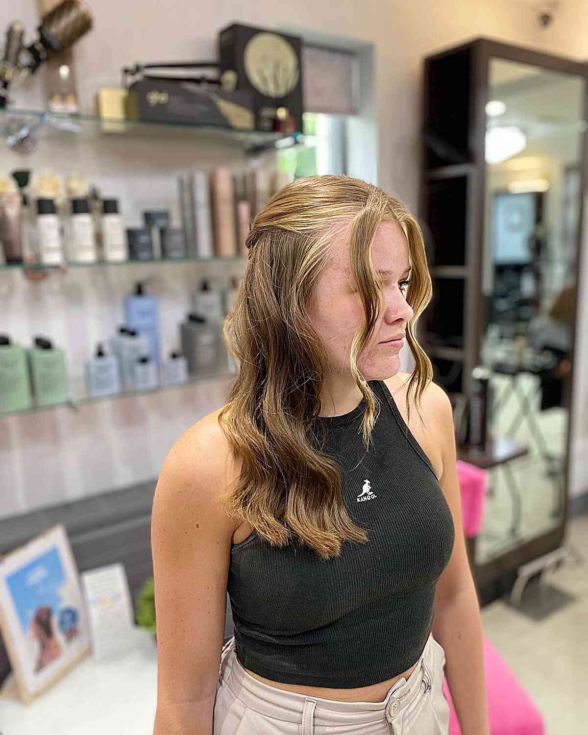 easy face framing half up with soft waves for girls graduation
