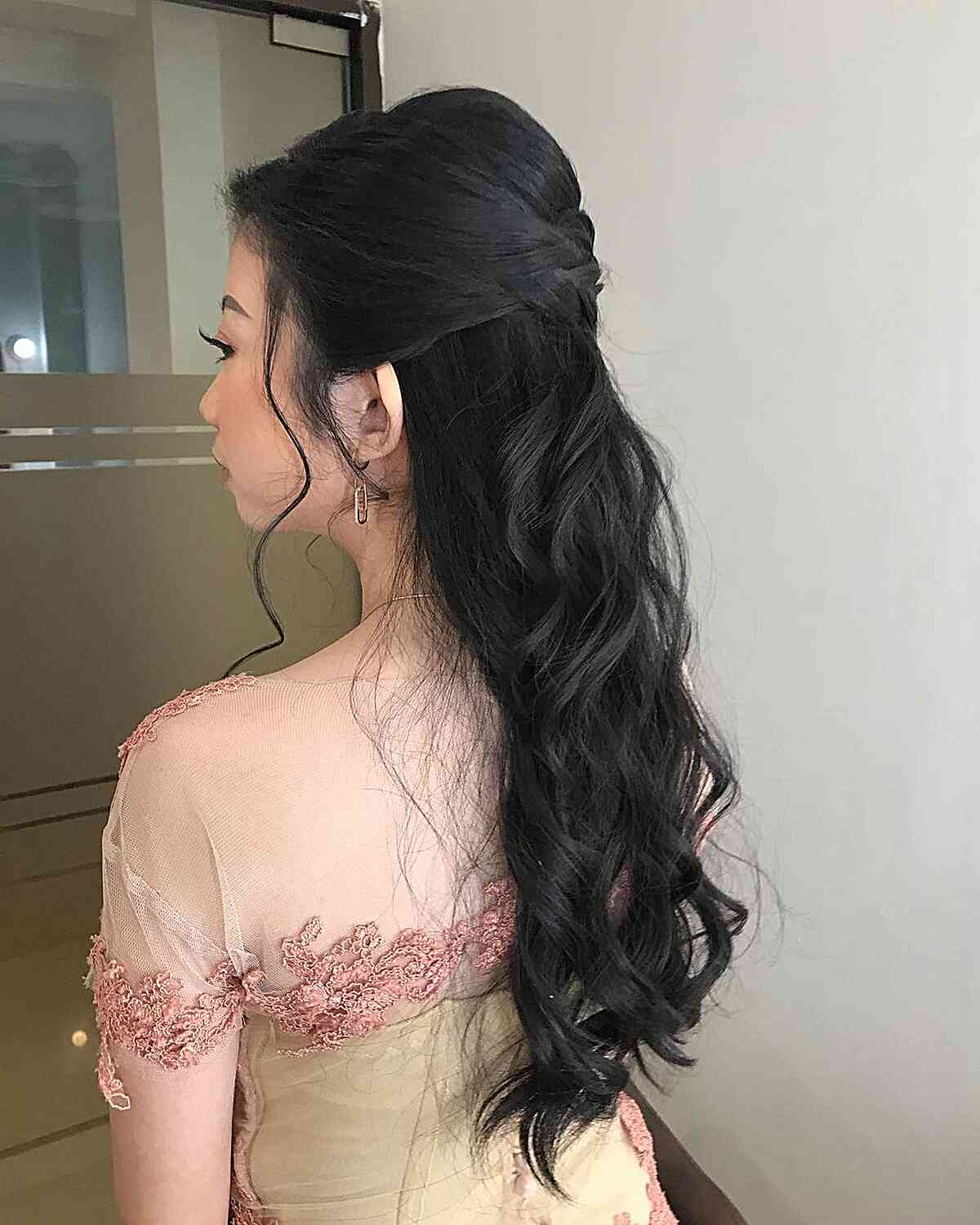 formal half up with tousled waves for graduating ladies