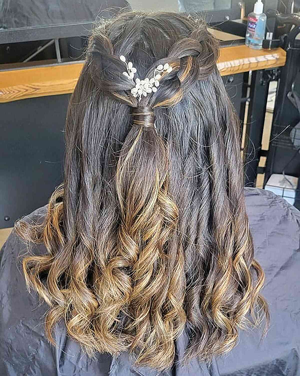 half down braid style with loose curls for graduating girls