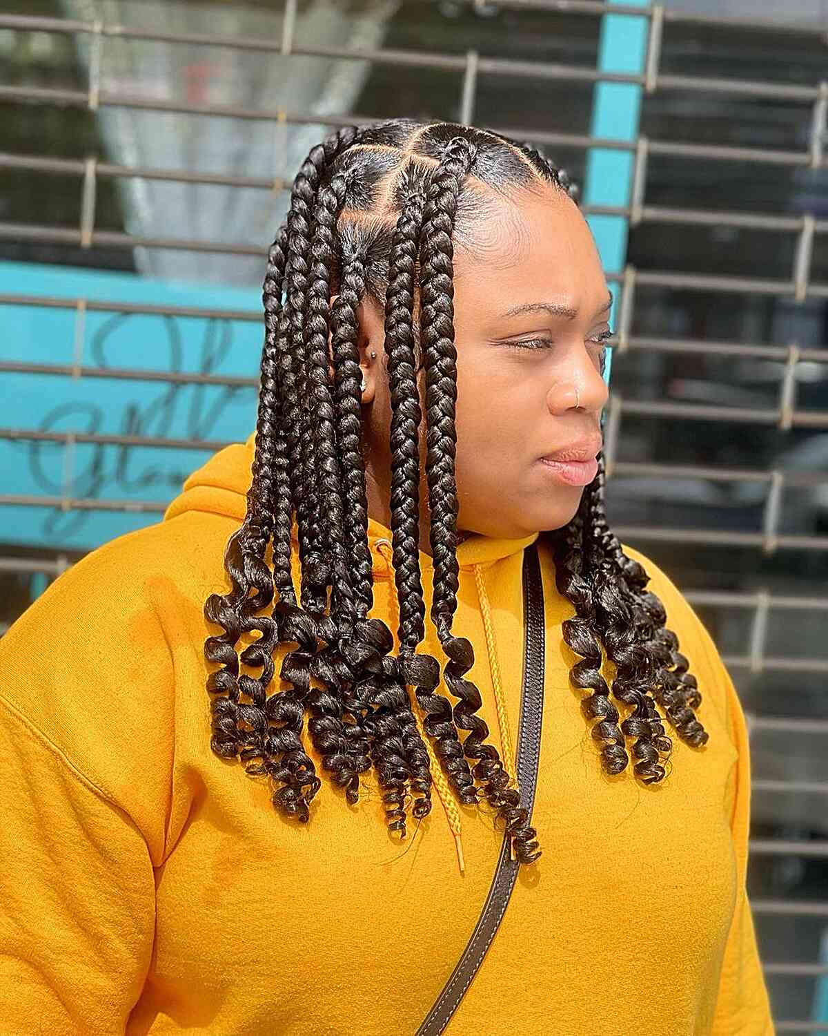 jumbo knotless braids and curled ends