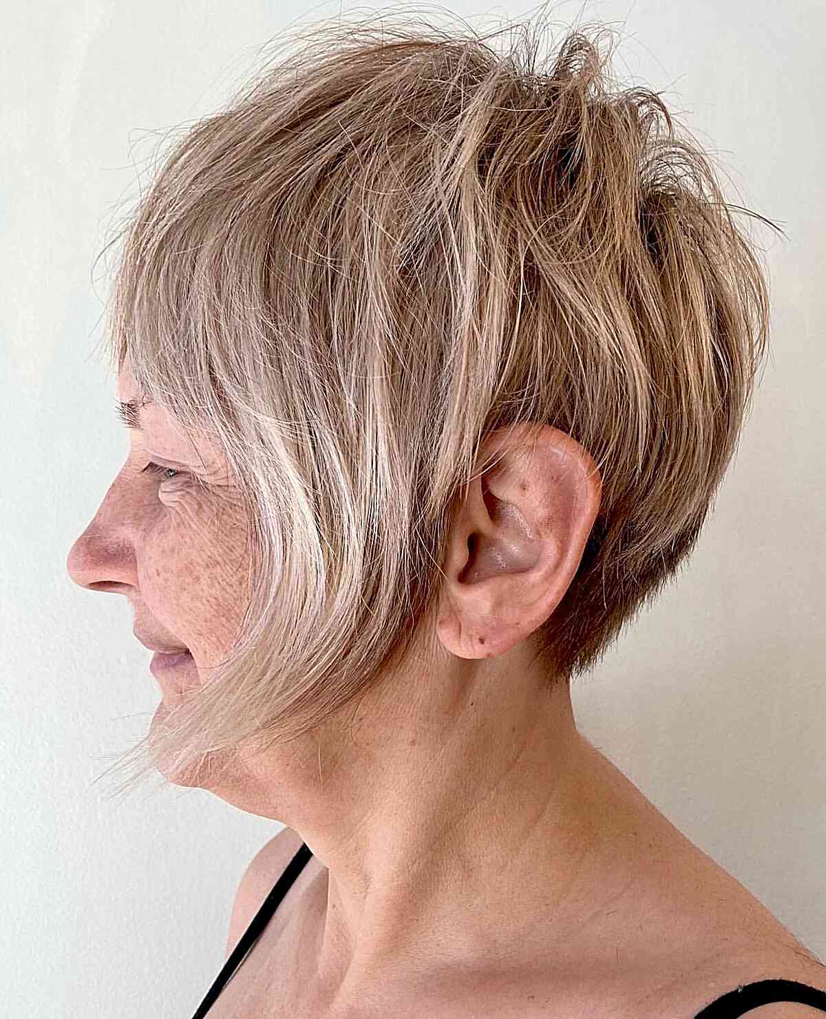 layered choppy pixie with long face frame on ladies passed their s