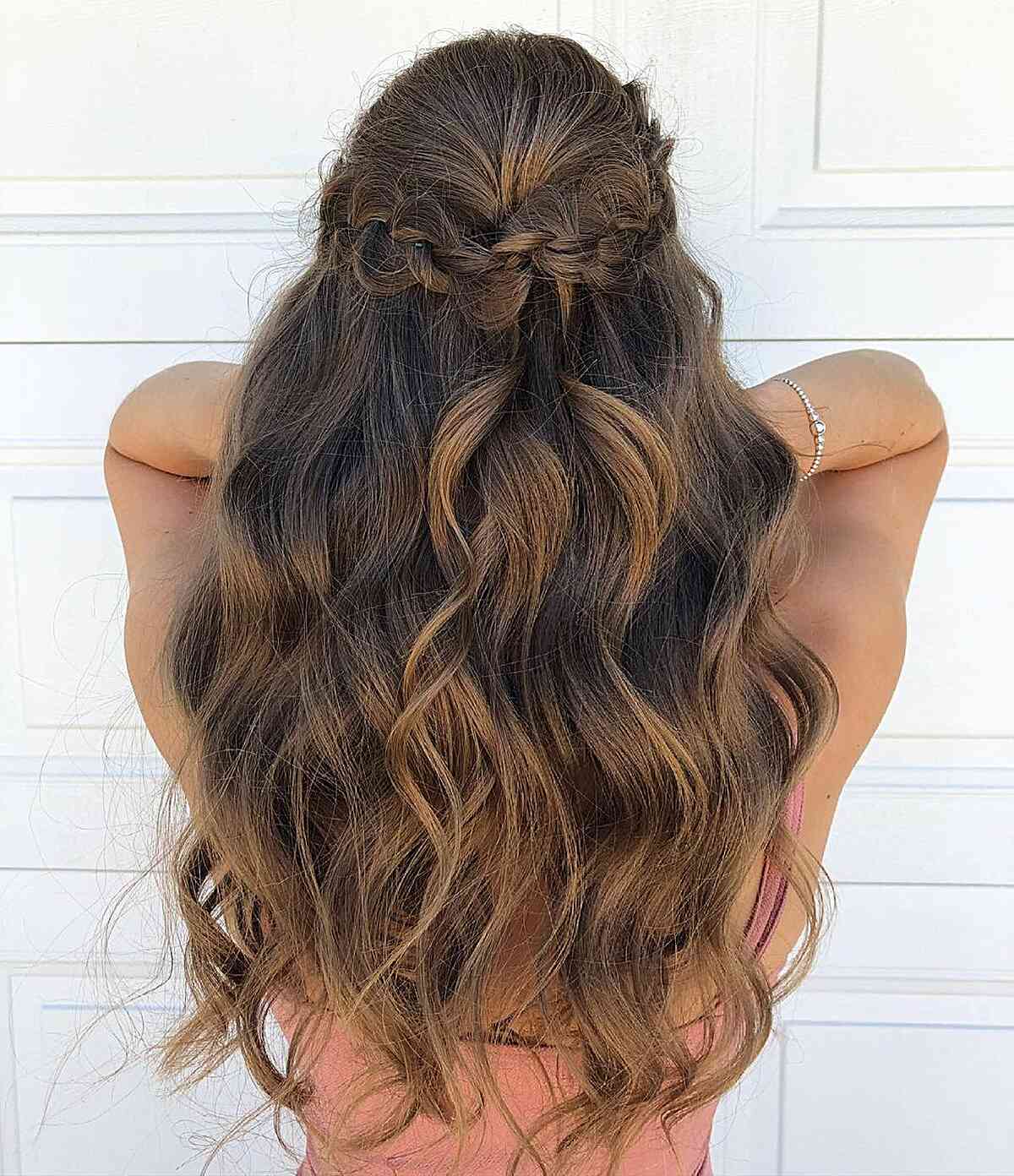 long braided half up with beach waves for graduation events