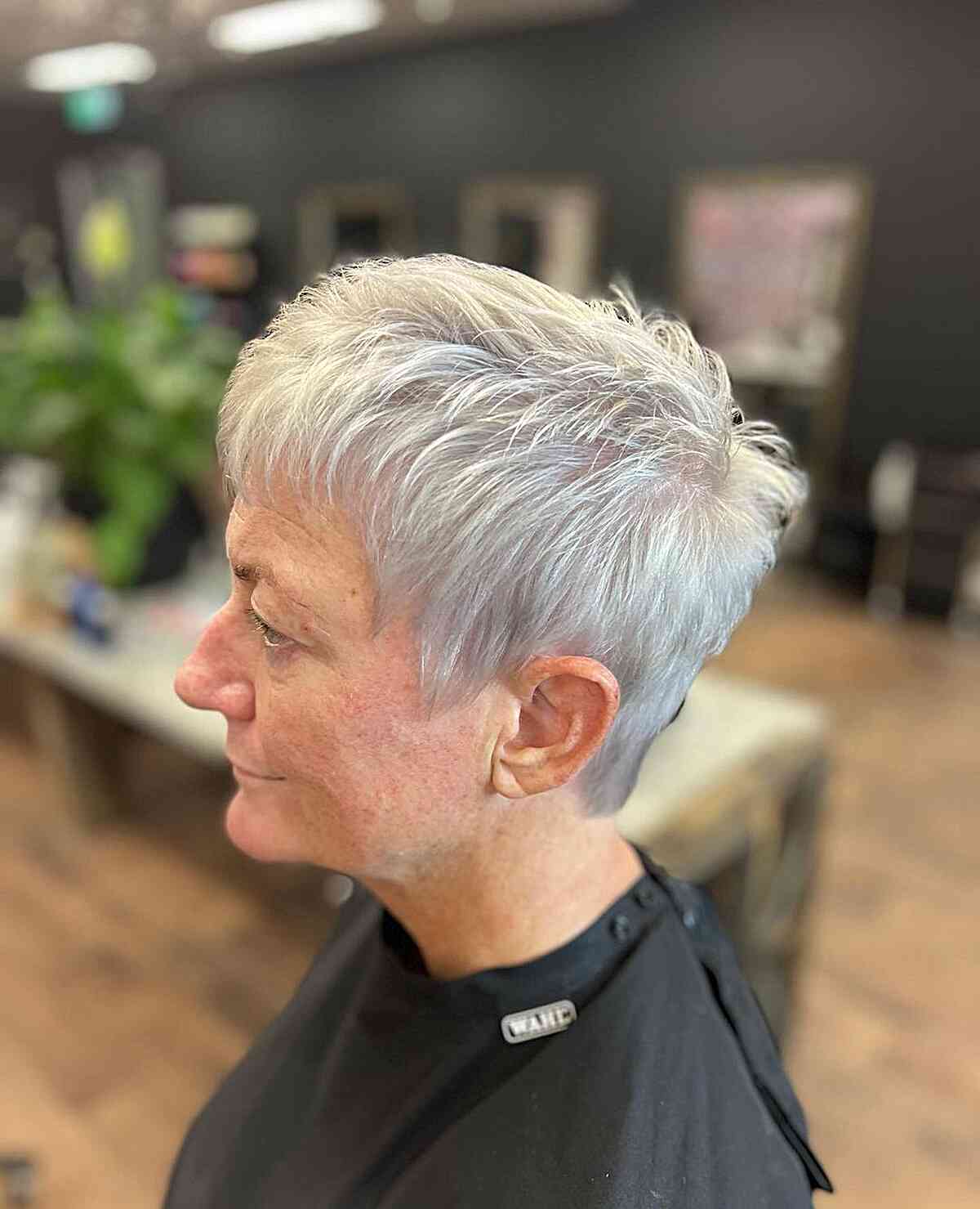 platinum blonde choppy pixie with thin bangs for women and up