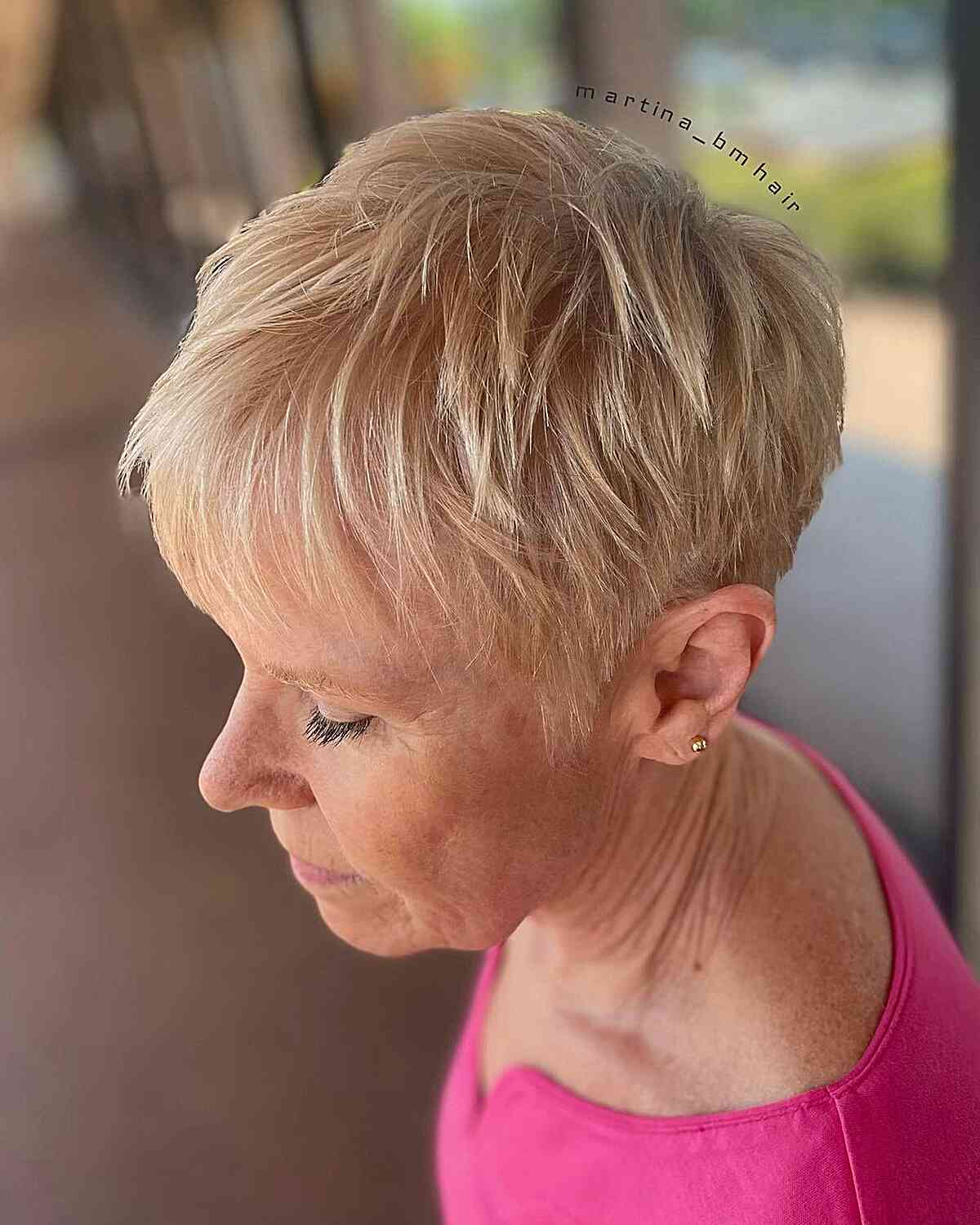 textured choppy pixie crop cut with wispy bangs for mature women over