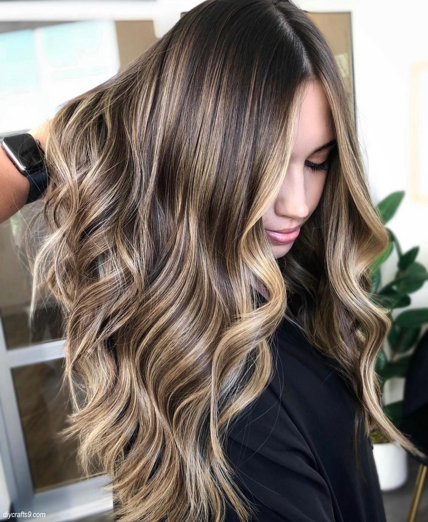 Icy Blonde Hair With Caramel Highlights