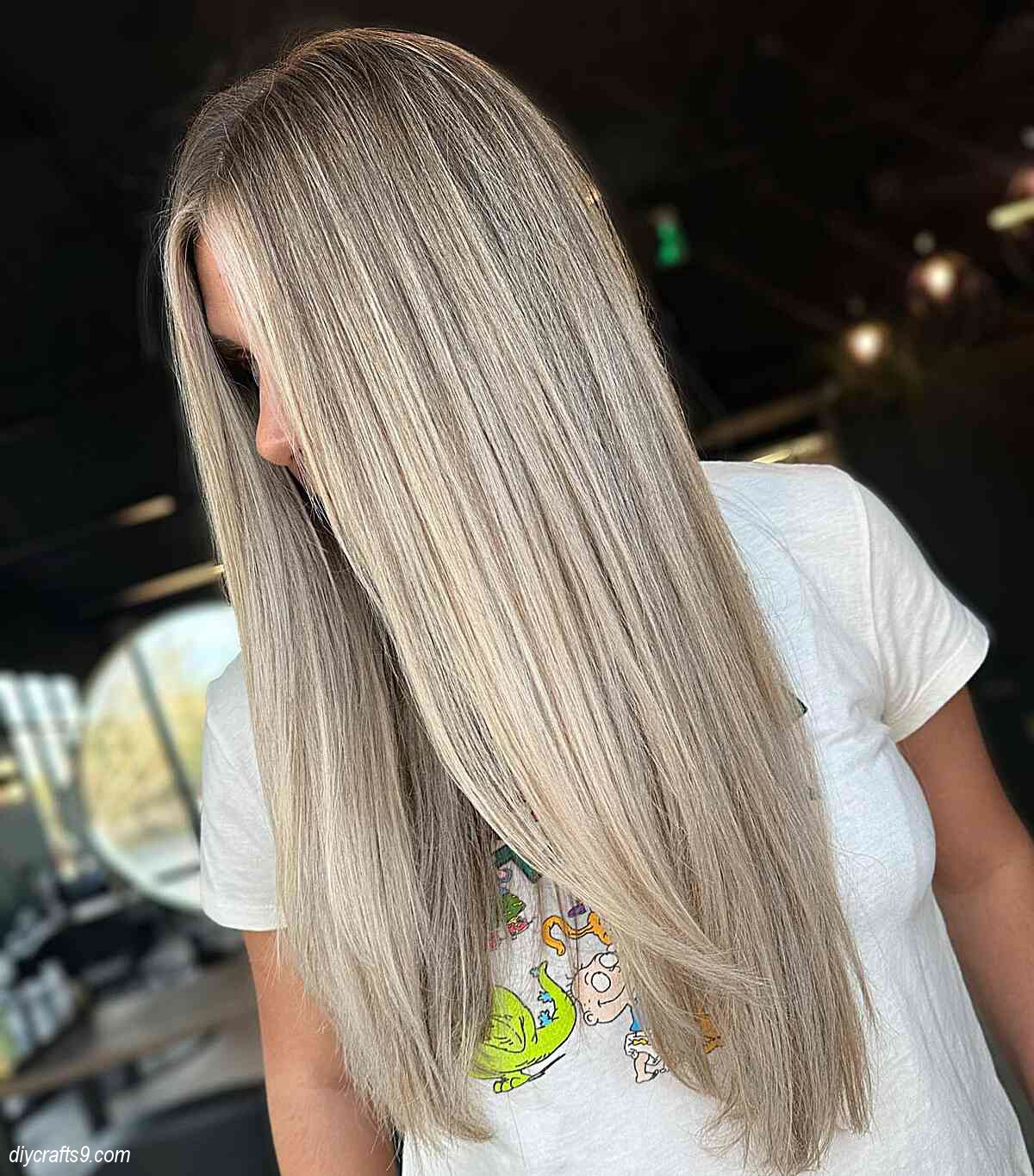 cool toned ash blonde balayage long straight hair