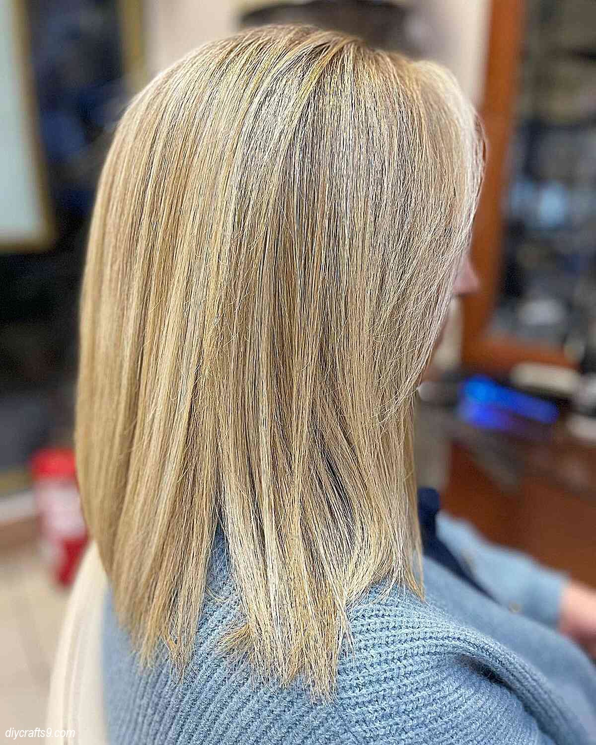 dimensional blonde balayage on shoulder length straight hair