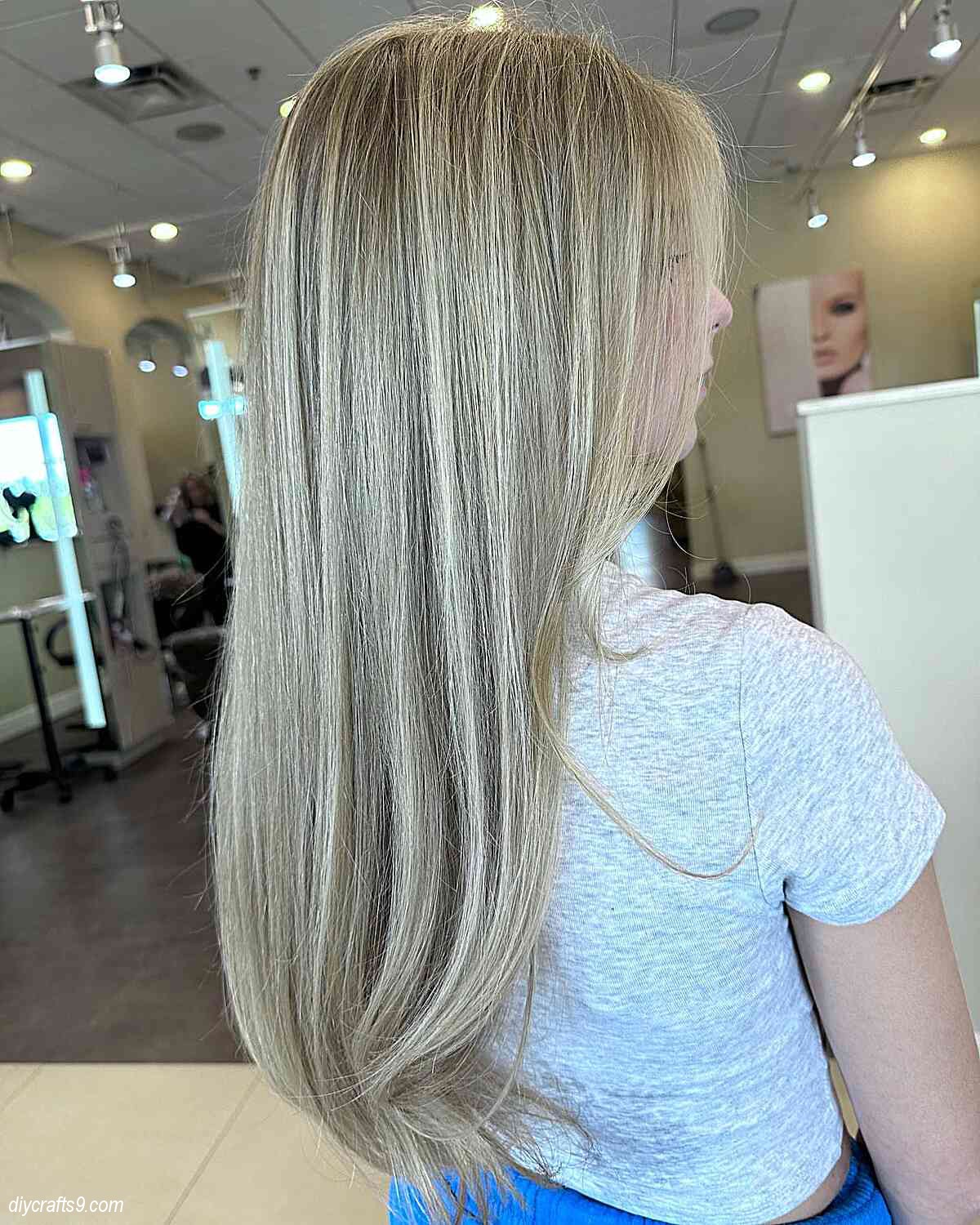 long and straight bright beige blonde balayage hair