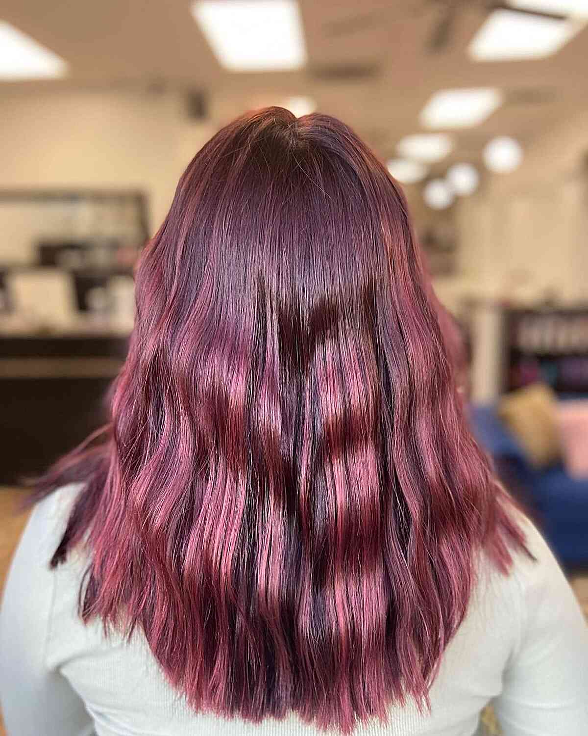 medium hair with fiery burgundy balayage