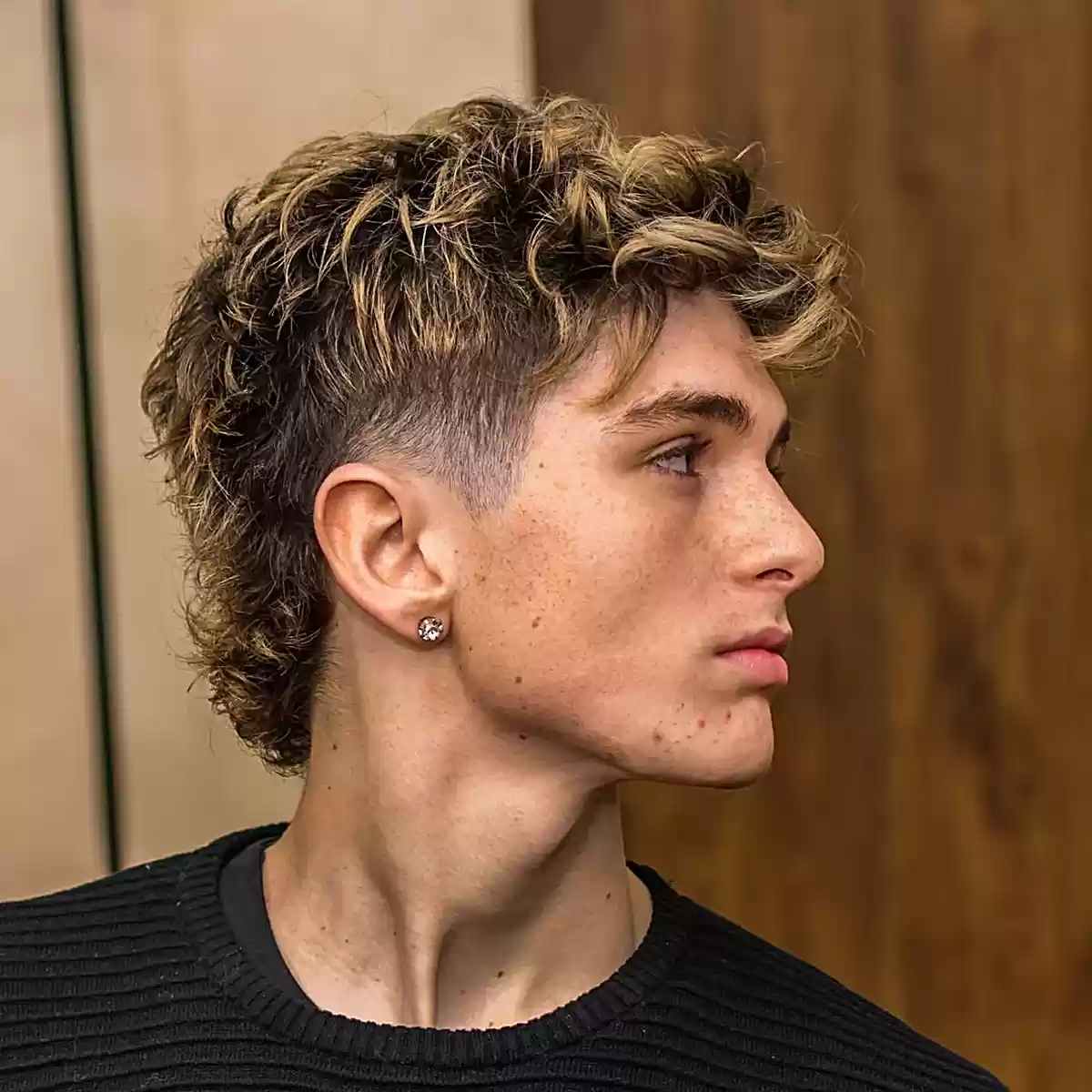 mullet with highlights and a taper fade