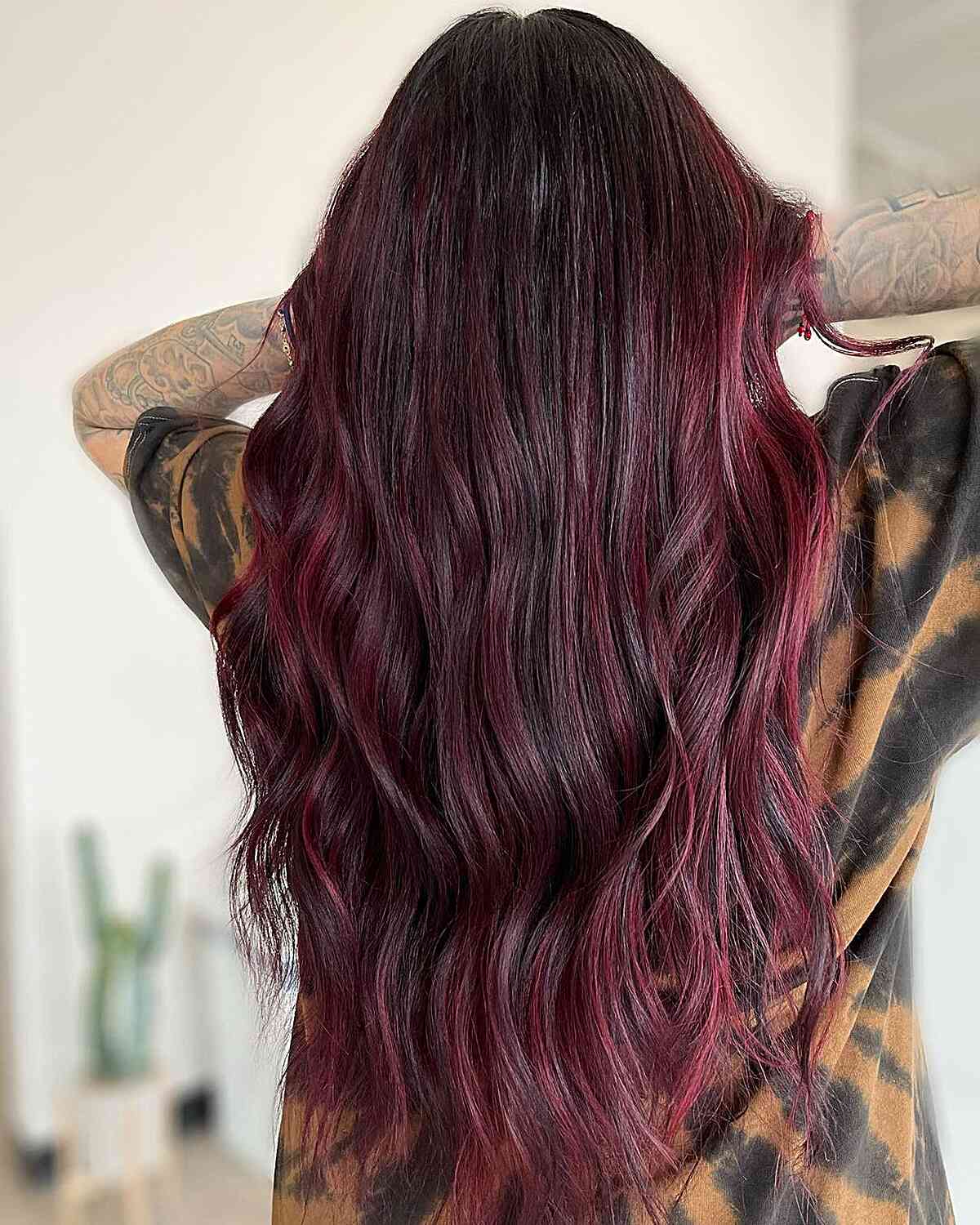 waste length dark raspberry burgundy balayage red hair