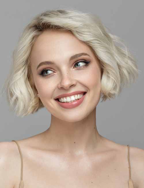Curled Short Blond Hairstyle