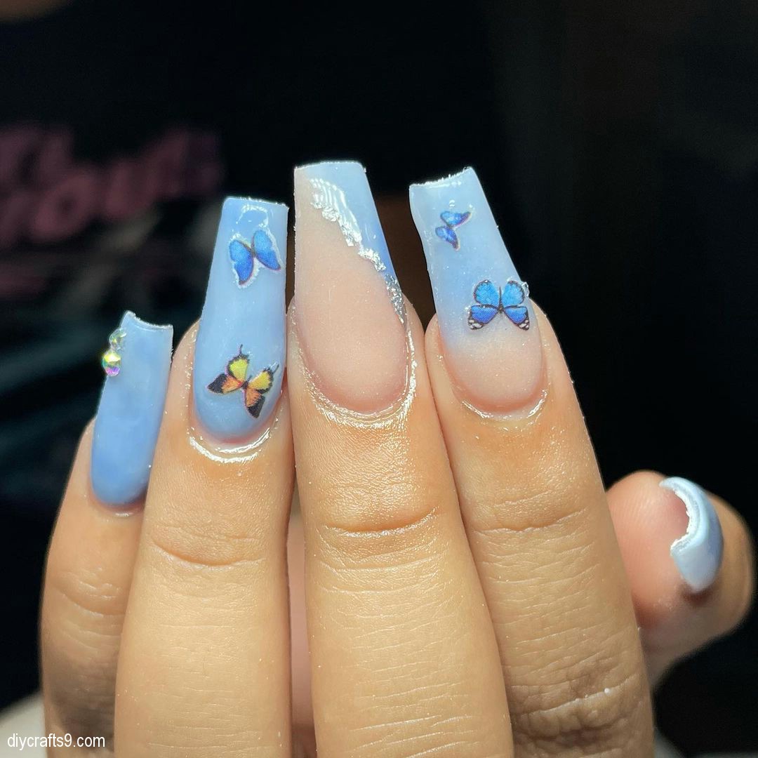 Baby Blue Nails With Butterflies