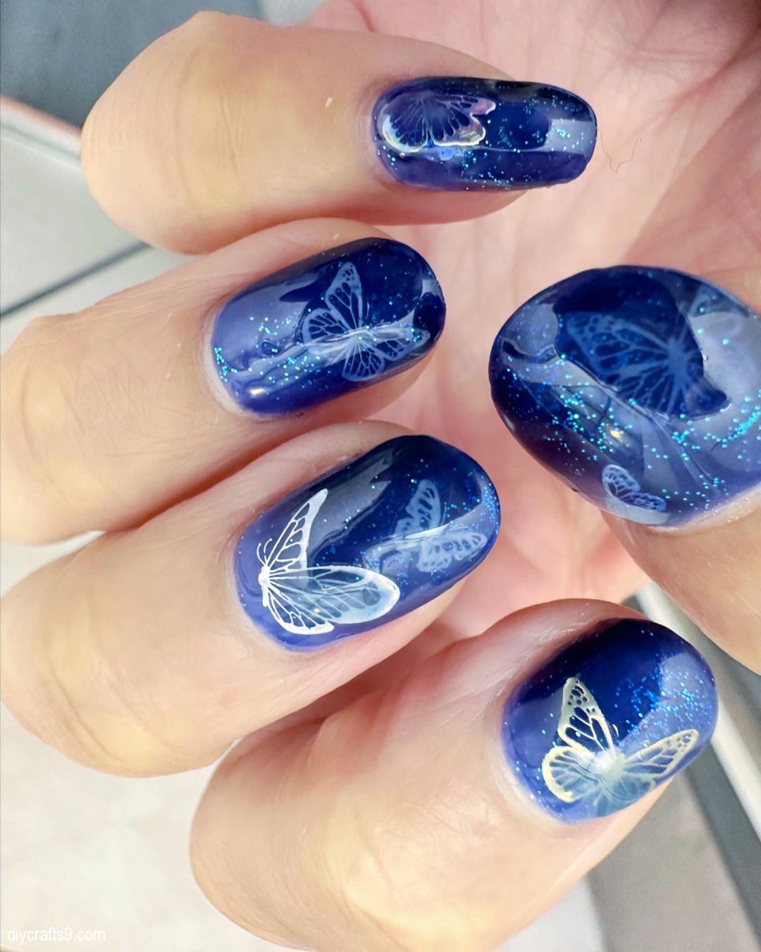 Royal Blue Nails With Butterflies