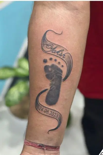 Symbolism Behind Baby Footprint Tattoos