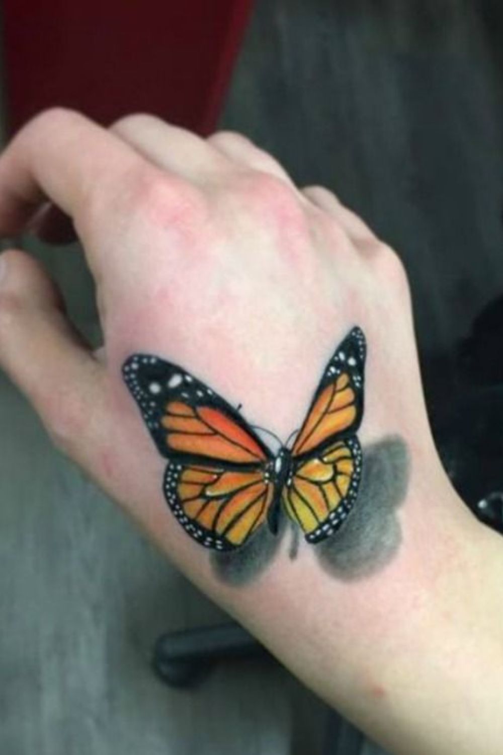 D Butterfly Hand Tattoo