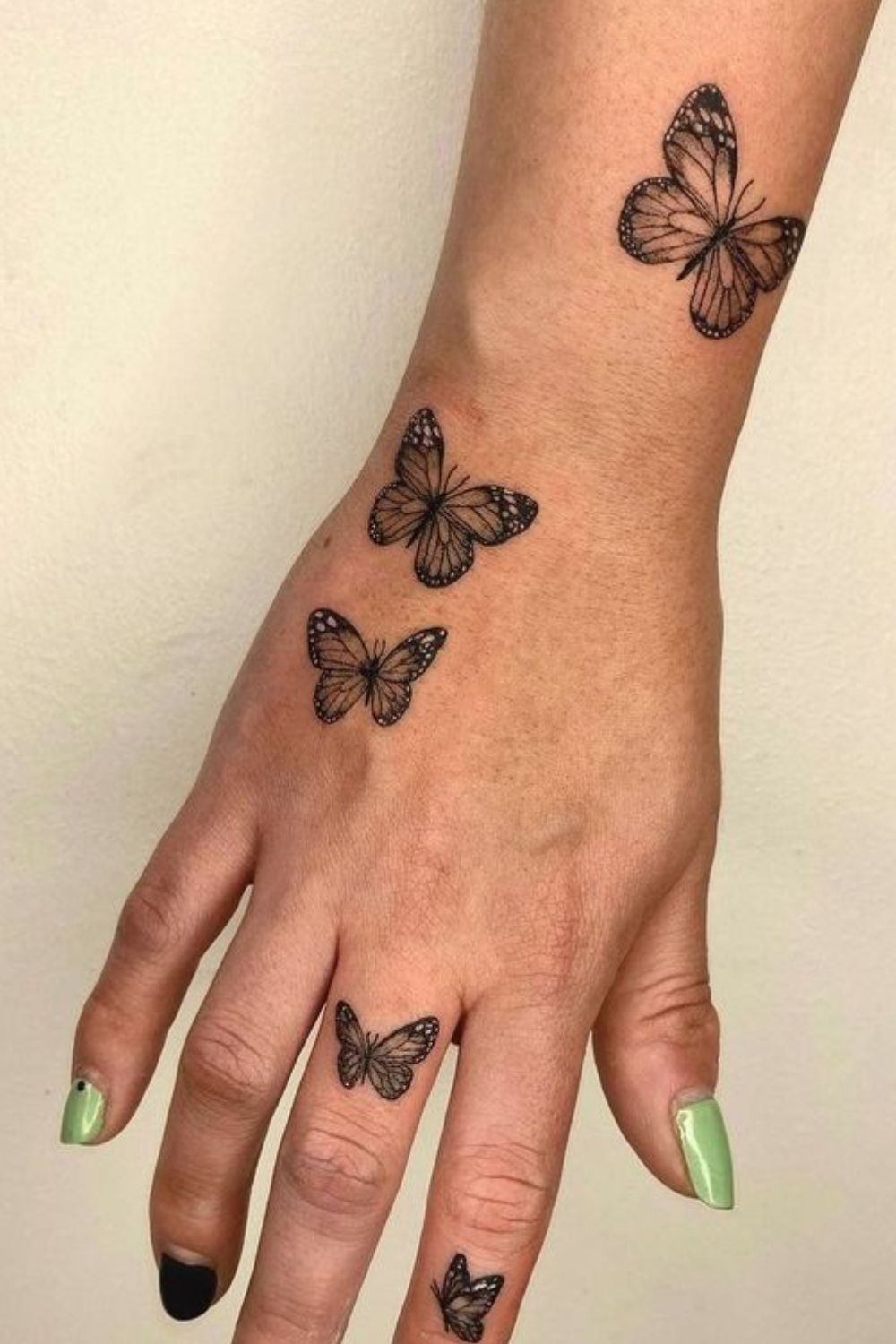 Abstract Butterfly Hand Tattoo