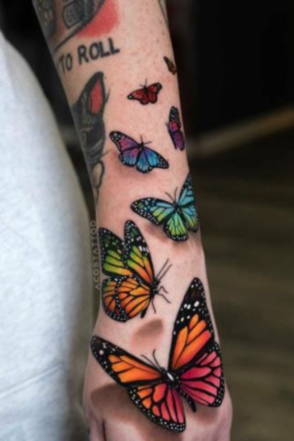 Realistic Butterfly Hand Tattoo