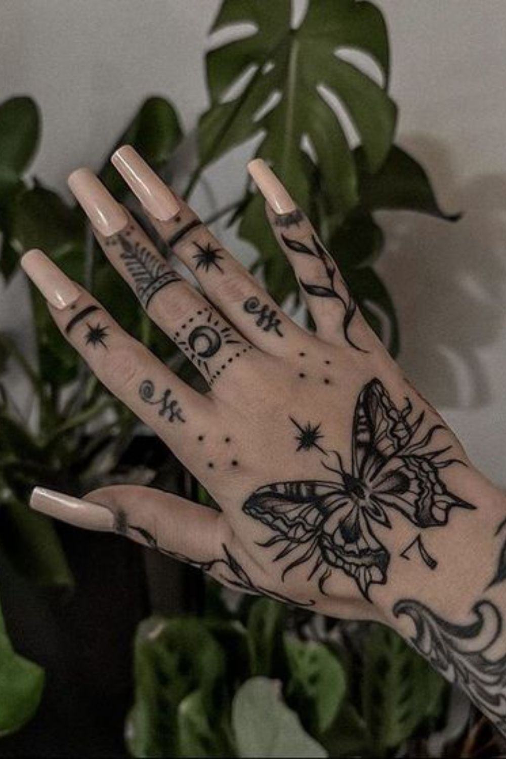 Vintage Butterfly Hand Tattoo